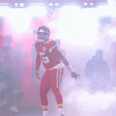 Football Player In Red Uniform Number 12 GIF