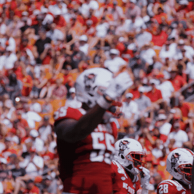 Football Player In Red Uniform Number 55 GIF