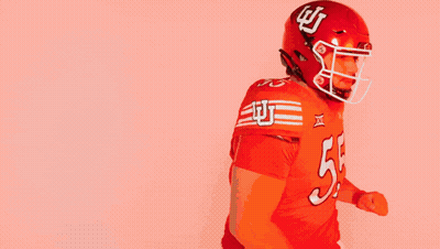 Football Player In Red Uniform Number 55 GIF