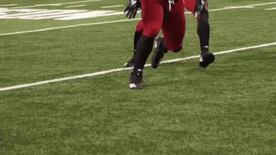 Football Player In Red Uniform Number 59 Running GIF