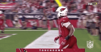 Football Player In Red Uniform Running Down Field GIF