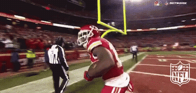Football Player In Red Uniform Running To Goal Line GIF