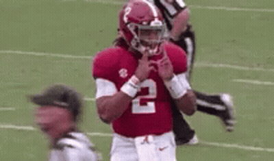 Football Player In Red Uniform With Referee GIF