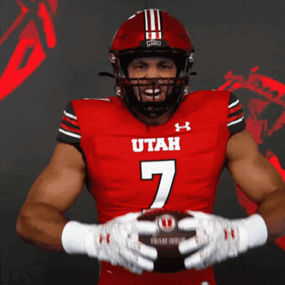 Football Player In Red Utah Jersey Holding Football GIF