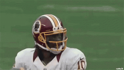 Football Player In Redskins Helmet Holding Football GIF