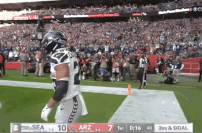 Football Player In Seahawks Uniform Running GIF