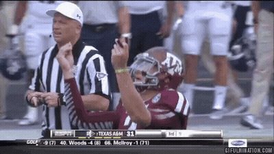 Football Player In Texas A&M Jersey With Referee GIF