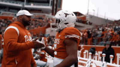 Football Player In Texas Jersey Shakes Hands GIF