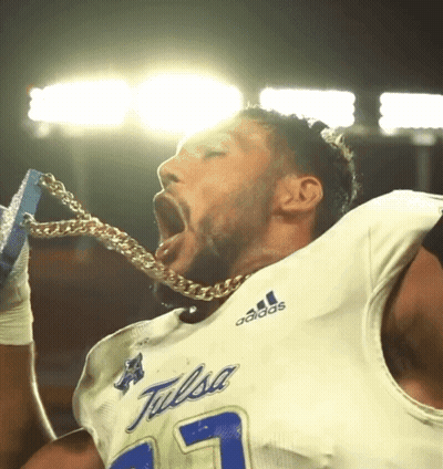 Football Player In Tulsa Jersey Holding Chain GIF