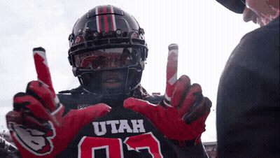 Football Player In Utah Jersey And Gloves Talks To Referee GIF