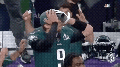 Football Player In VR Headset Celebrating Touchdown GIF