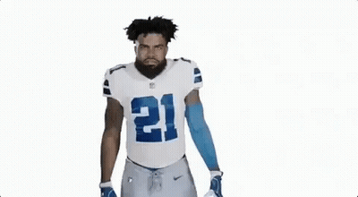 Football Player In White And Blue Uniform Flexing GIF