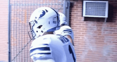 Football Player In White Helmet And Jersey Number 1 GIF