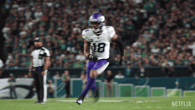 Football Player In White Jersey And Purple Pants Running GIF