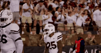 Football Player In White Jersey Number 25 Running GIF
