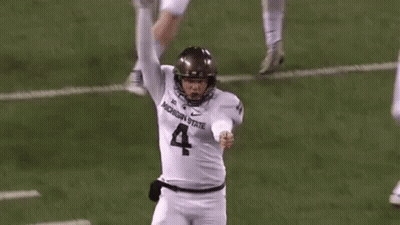 Football Player In White Jersey Number 4 Kicking Ball GIF
