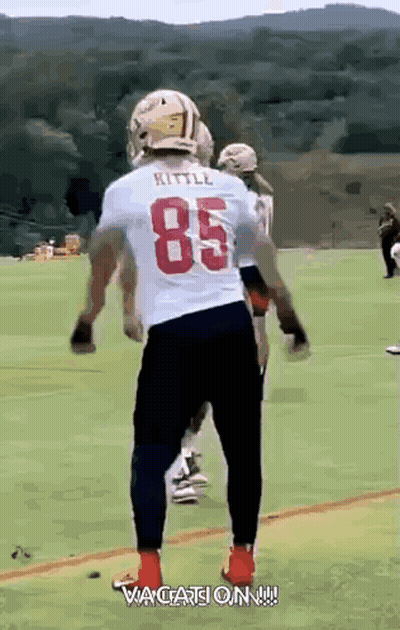 Football Player In White Jersey Number 85 On Field GIF