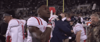 Football Player In White Jersey With Red Stripe GIF