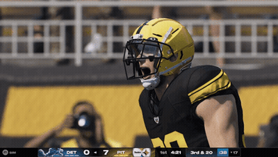 Football Player In Yellow Helmet In Front Of Scoreboard GIF