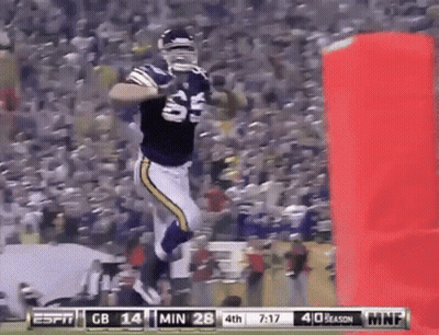 Football Player Jumping During Game Score 28-14 GIF
