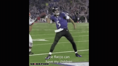 Football Player Jumping Holding Ball GIF