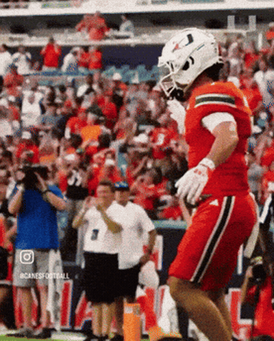 Football Player Jumping In Red Jersey GIF