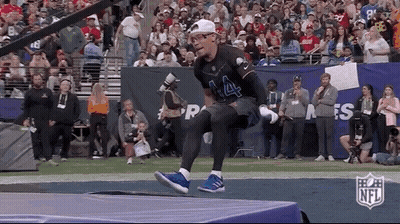 Football Player Jumping Over Hurdle GIF