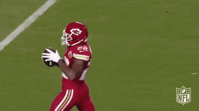 Football Player Jumping To Catch Ball GIF