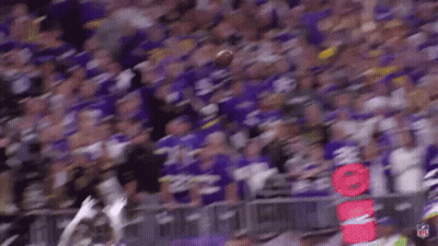 Football Player Jumping To Catch Ball GIF