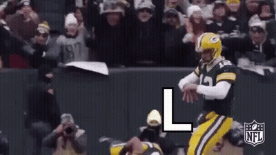 Football Player Kicking Ball In Helmet GIF