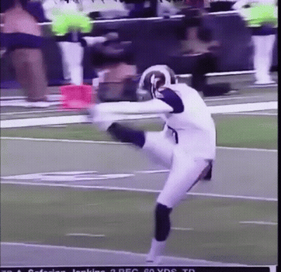 Football Player Kicking Ball Wearing Rams Helmet GIF