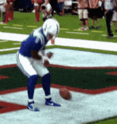 Football Player Kicking In Blue And White Uniform GIF