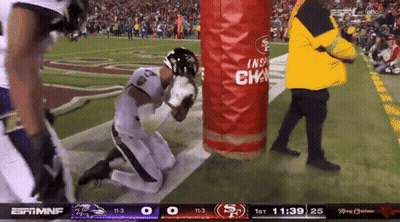 Football Player Kneeling Before Red Bag Saying Inspiration GIF