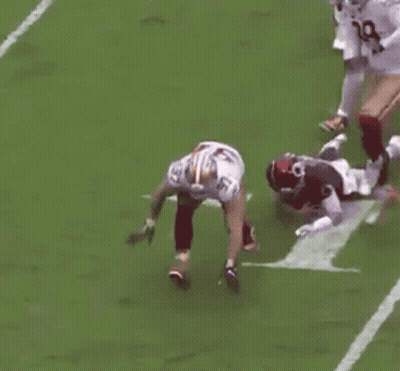 Football Player Kneeling During Tackle GIF