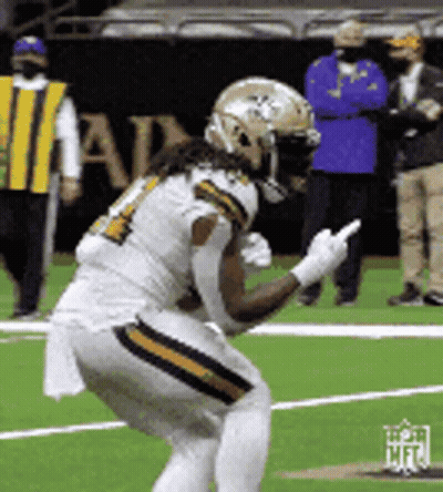 Football Player Kneeling Giving Middle Finger GIF