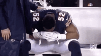 Football Player Kneeling Head Down GIF