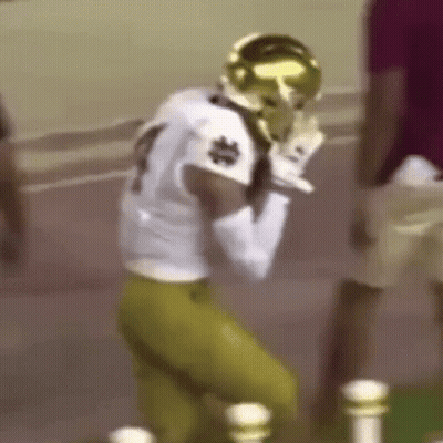 Football Player Kneeling In White Jersey GIF