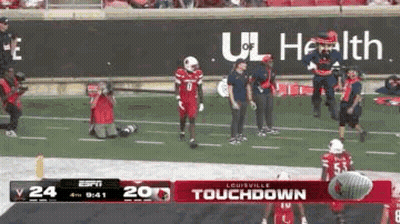 Football Player Kneeling On Field GIF