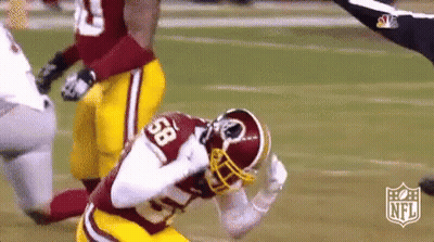 Football Player Kneeling On Field GIF