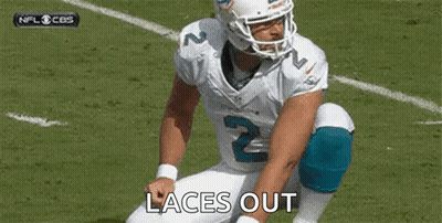 Football Player Kneeling Tying Shoes GIF