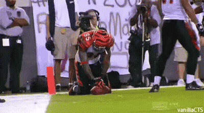 Football Player Kneeling With Number 35 GIF