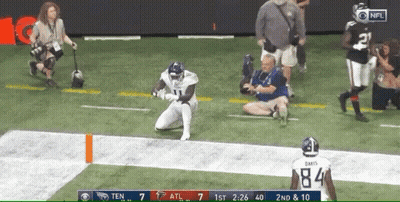 Football Player Kneeling With Number 84 GIF
