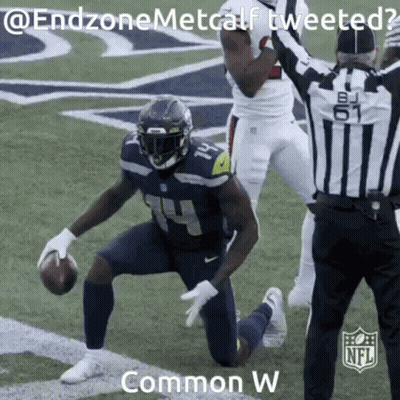 Football Player Kneeling With Referee GIF