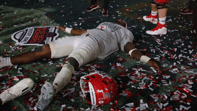 Football Player Laying On Field With Confetti Saying Big Boy Winners GIF