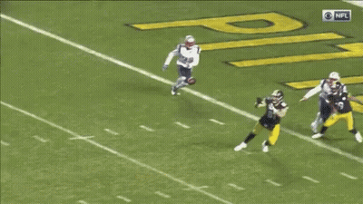 Football Player Lying On Field GIF