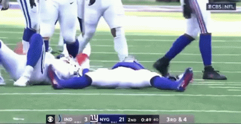 Football Player Lying On Field Vs Indianapolis Colts GIF