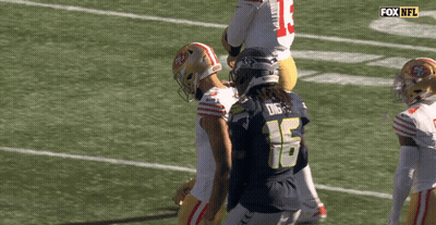 Football Player Mike Evans Standing On Field GIF