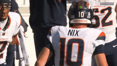 Football Player Nix On Back GIF