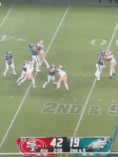 Football Player Number 0 Kneeling On Field GIF