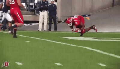 Football Player Number 06 Kneeling On Field GIF